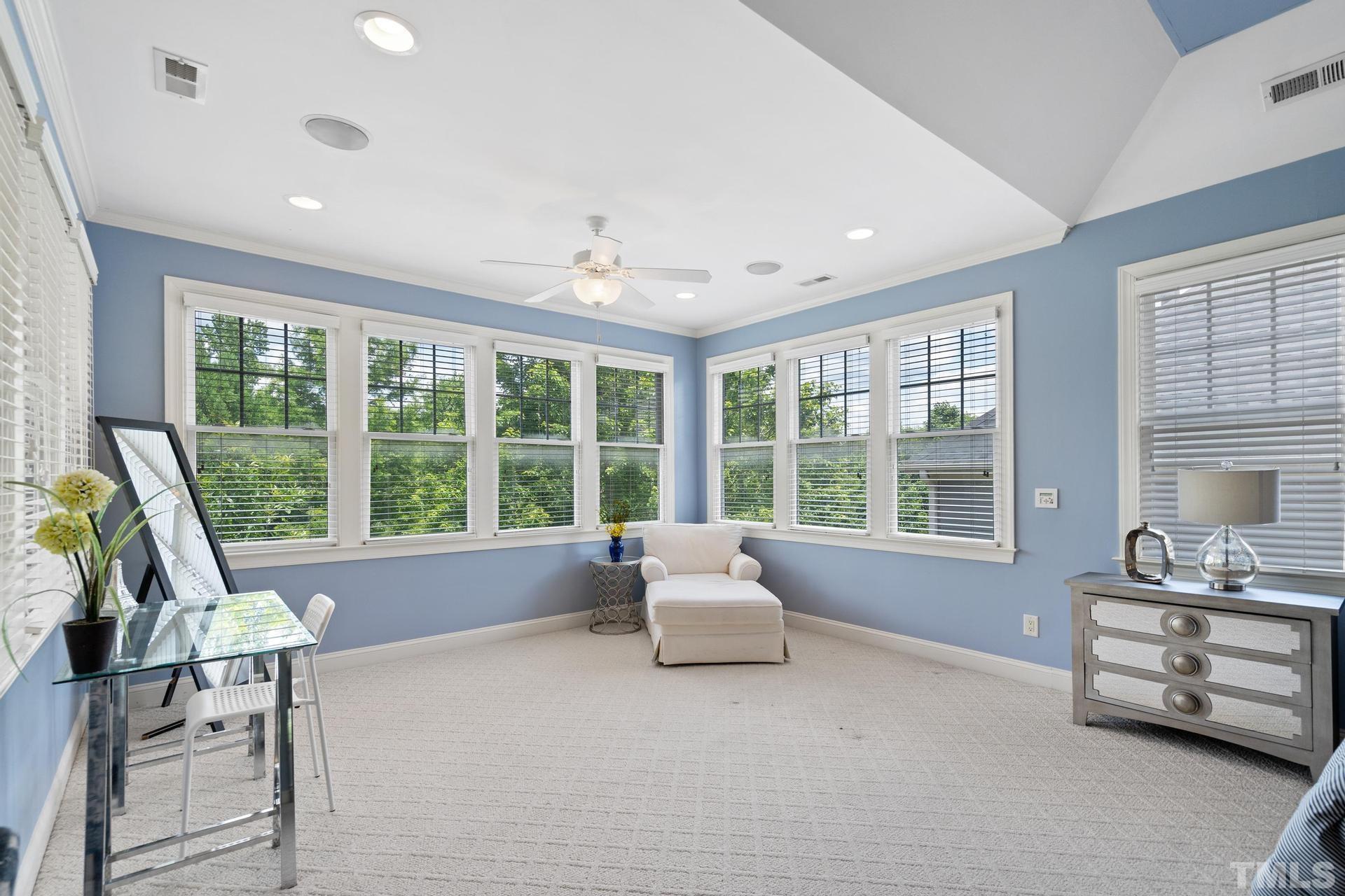 3005 London Bell Drive Raleigh, NC 27614 - Photo 65 of 73 a living room with furniture and windows