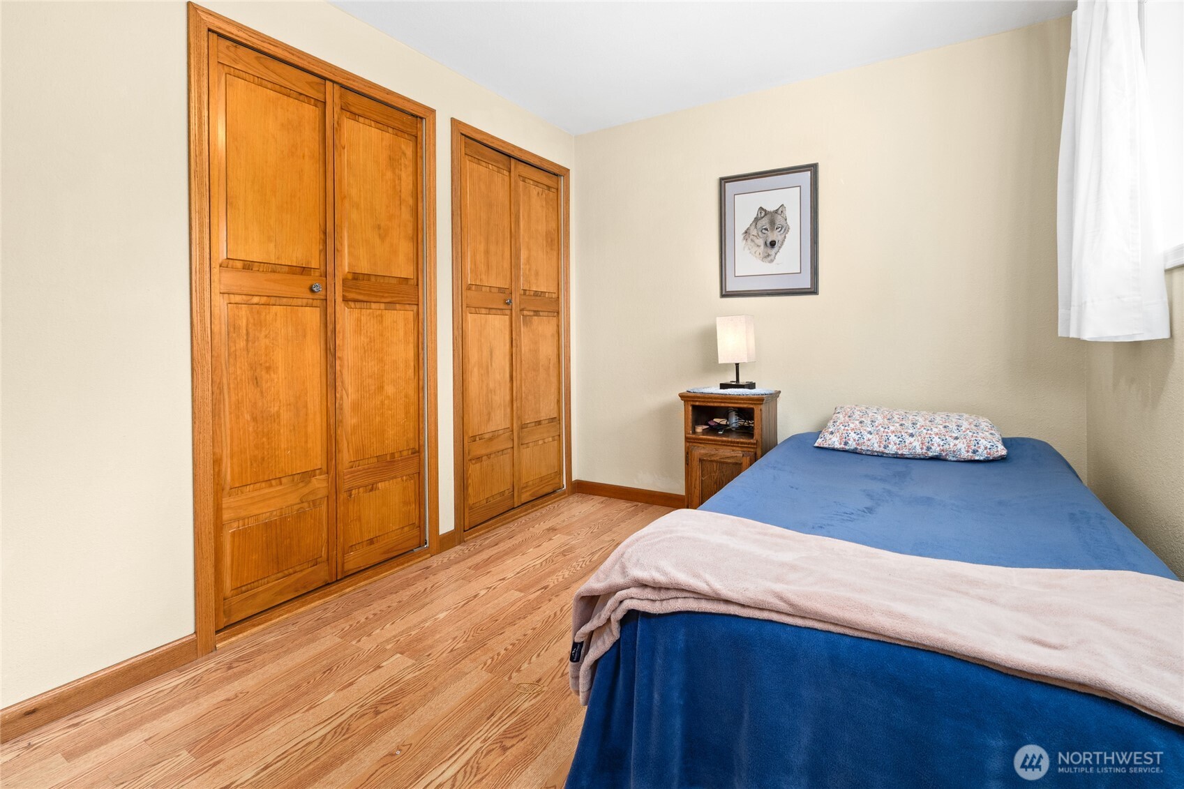 6202 224th Street Southwest Mountlake Terrace, WA 98043 - Photo 13 of 23 a bedroom with a bed and a window