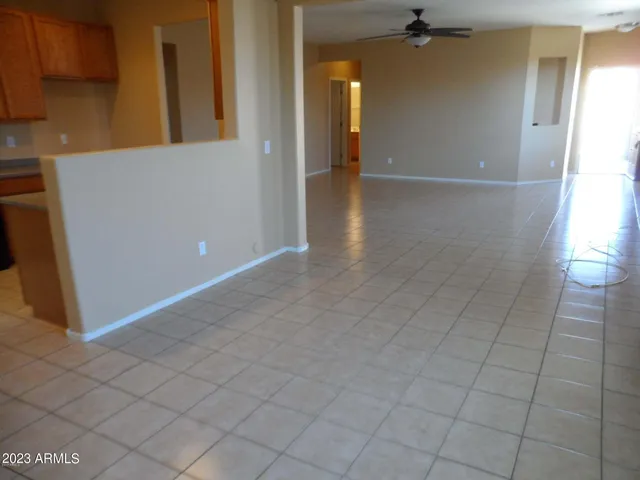 a kitchen with stainless steel appliances a refrigerator and a stove top oven
