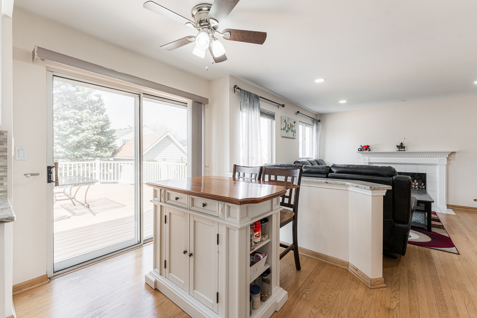 341 Sundance Drive Bartlett, IL 60103 - Photo 11 of 40 a kitchen that has a lot of cabinets and wooden floor