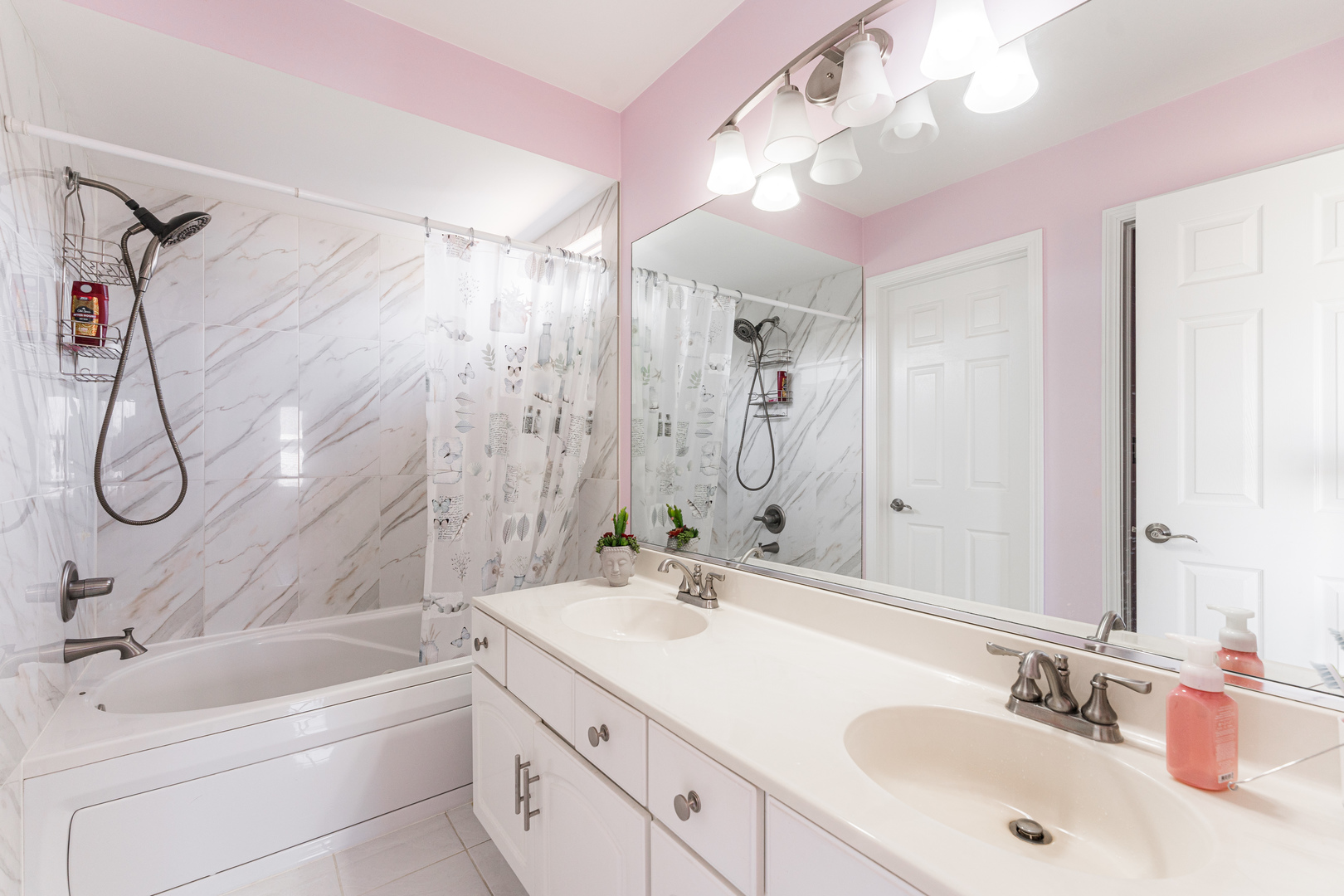 341 Sundance Drive Bartlett, IL 60103 - Photo 22 of 40 a bathroom with a double vanity sink mirror double and shower