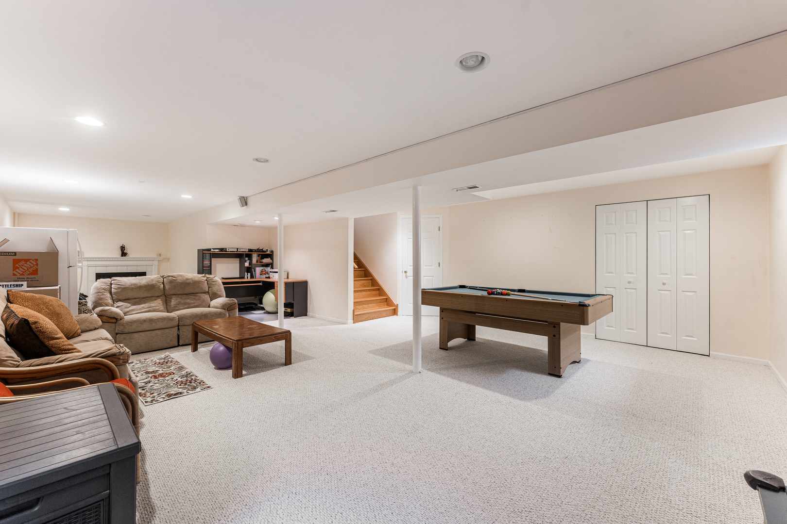 341 Sundance Drive Bartlett, IL 60103 - Photo 27 of 40 a living room with furniture and a wooden floor