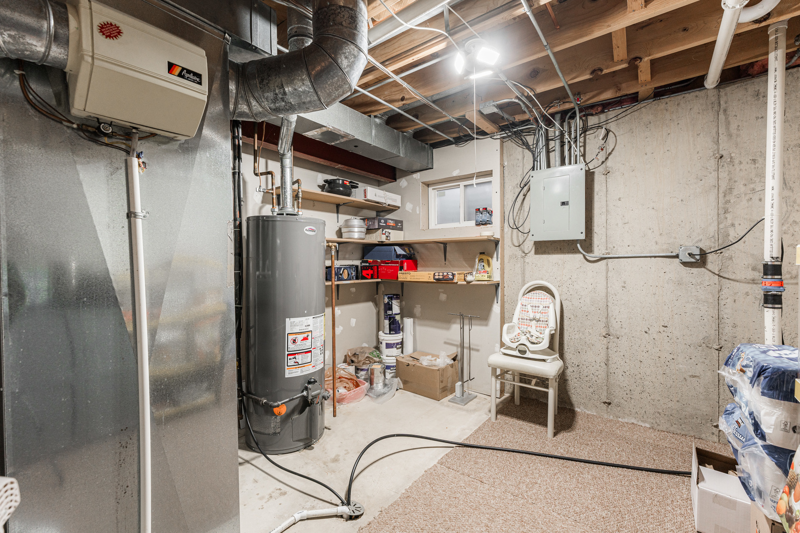 341 Sundance Drive Bartlett, IL 60103 - Photo 29 of 40 a utility room with dryer washer and stair