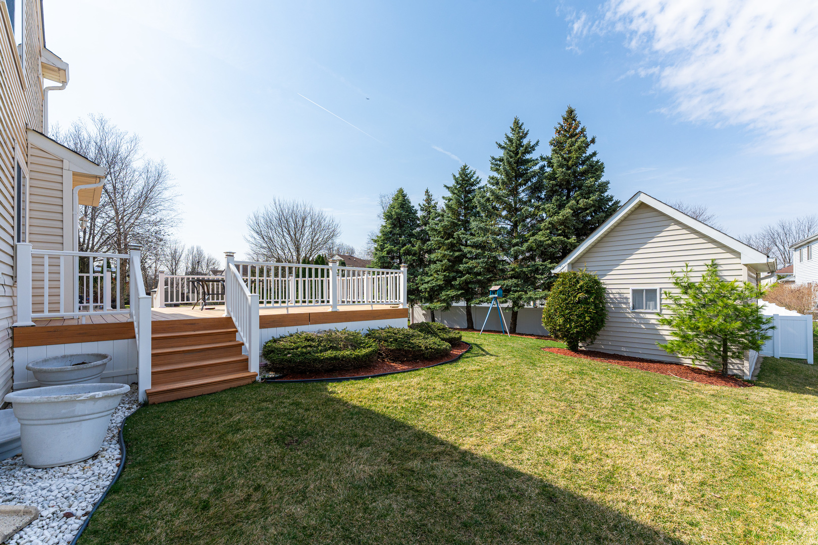 341 Sundance Drive Bartlett, IL 60103 - Photo 35 of 40 a view of a house with a yard and plants
