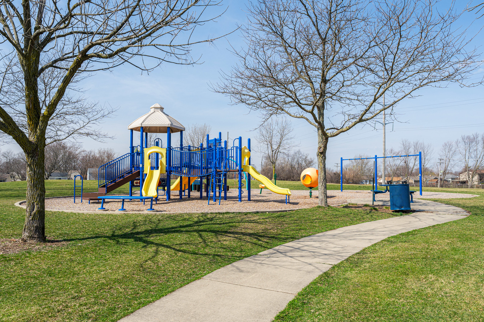 341 Sundance Drive Bartlett, IL 60103 - Photo 37 of 40 a view of a park with swings and slides