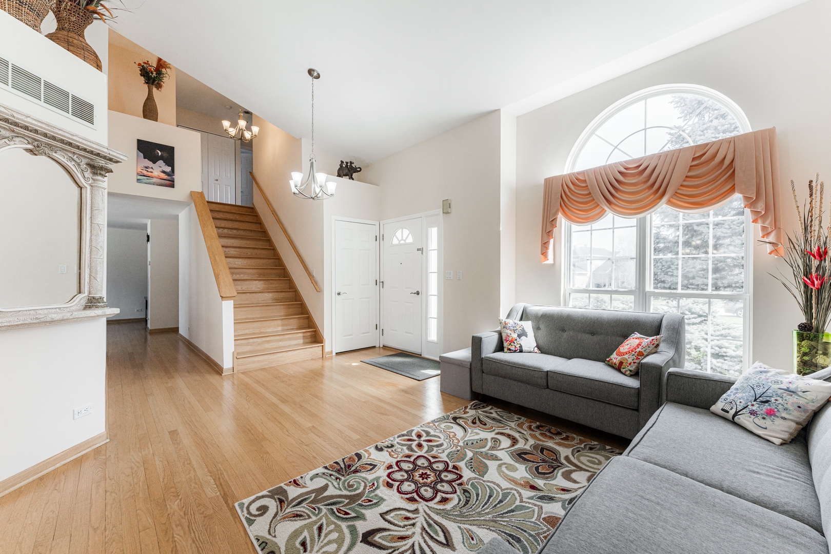 341 Sundance Drive Bartlett, IL 60103 - Photo 6 of 40 a living room with furniture and a large window