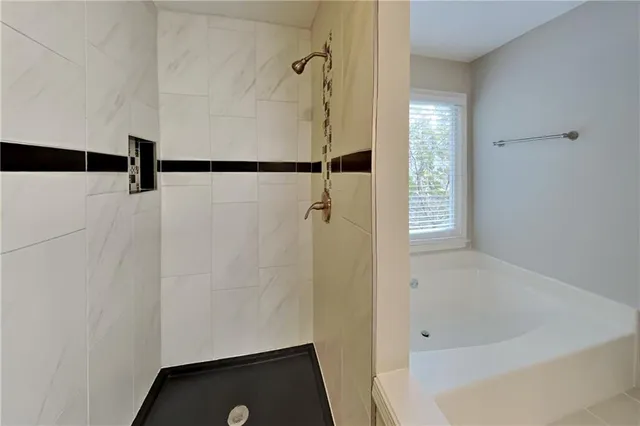 a bathroom with a bathtub
