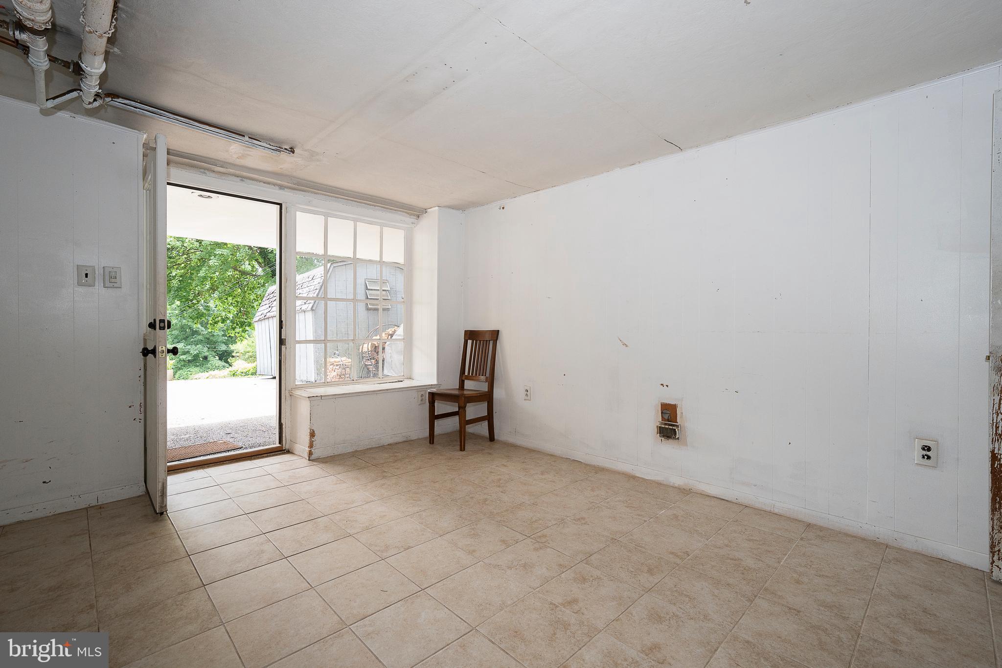 472 St Davids Avenue Wayne, PA 19087 - Photo 33 of 48 Partially finished basement with walkout access