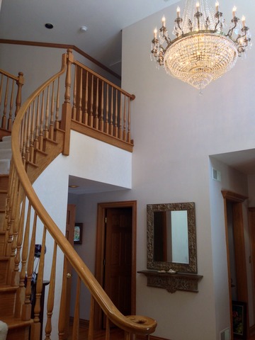 988 Plum Tree Road Fox River Grove, IL 60021 - Photo 2 of 25 a view of a livingroom with wooden floor and stairs