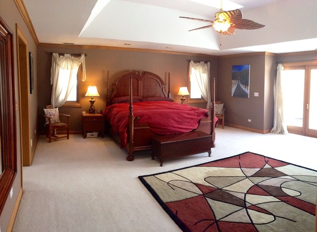 988 Plum Tree Road Fox River Grove, IL 60021 - Photo 12 of 25 a bedroom with a bed and window