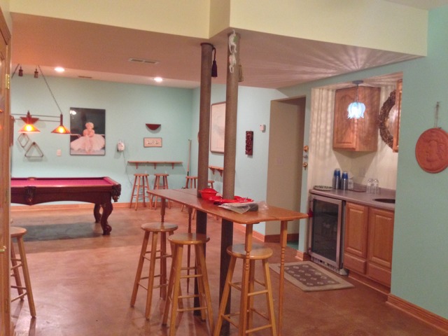 988 Plum Tree Road Fox River Grove, IL 60021 - Photo 21 of 25 a living room with furniture a flat screen tv and a fireplace