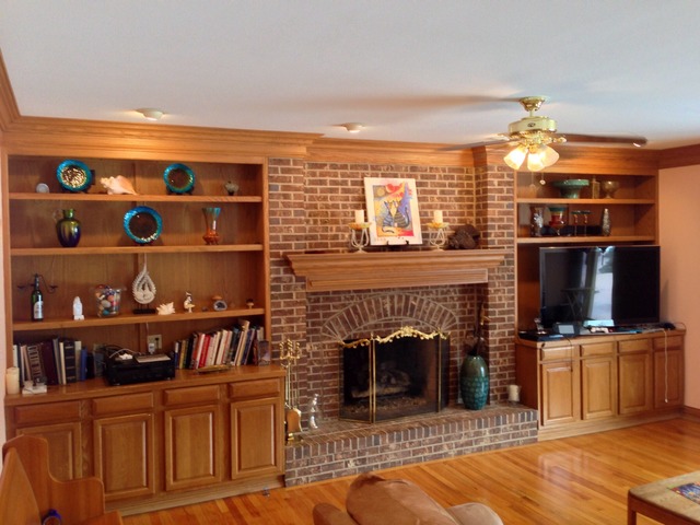 988 Plum Tree Road Fox River Grove, IL 60021 - Photo 9 of 25 a living room with fireplace furniture and a flat screen tv