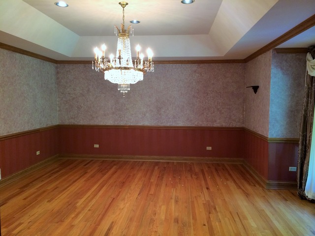 988 Plum Tree Road Fox River Grove, IL 60021 - Photo 10 of 25 a view of room with wooden floor and chandelier