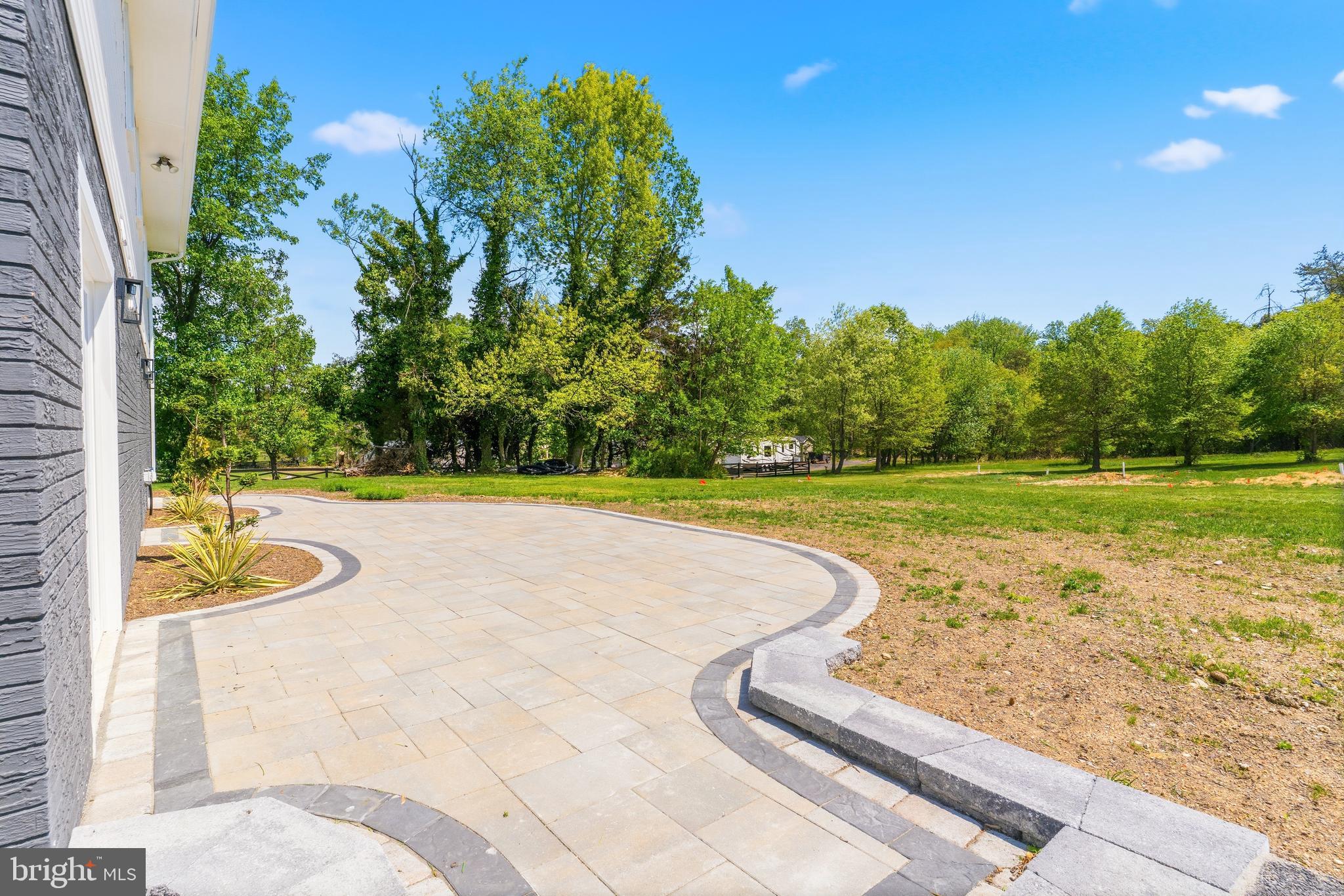 15810 Letcher Road Brandywine, MD 20613 - Photo 13 of 50 a view of a swimming pool with a yard