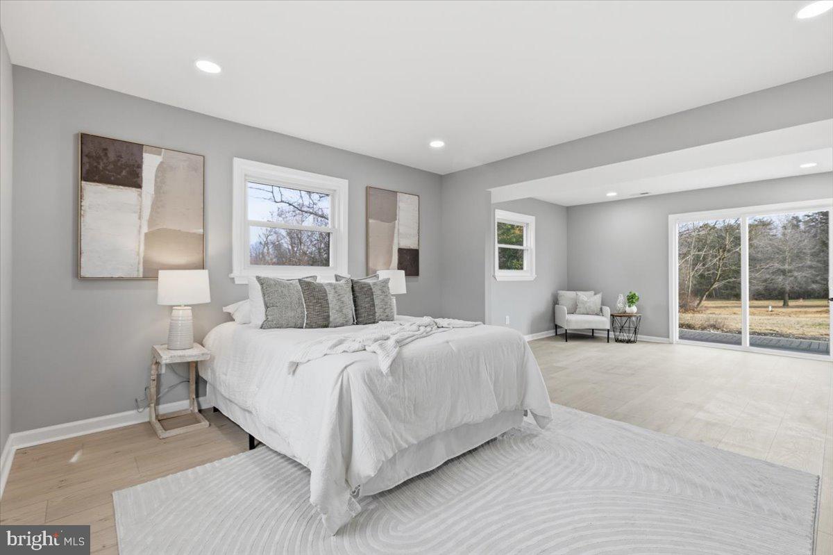 15810 Letcher Road Brandywine, MD 20613 - Photo 16 of 50 a bed room with a bed and a large window