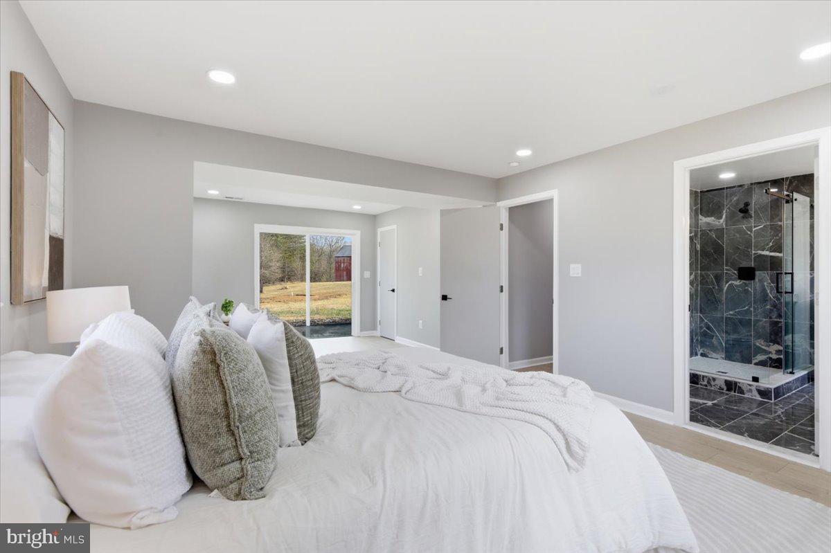 15810 Letcher Road Brandywine, MD 20613 - Photo 17 of 50 a bed room with a bed and a window