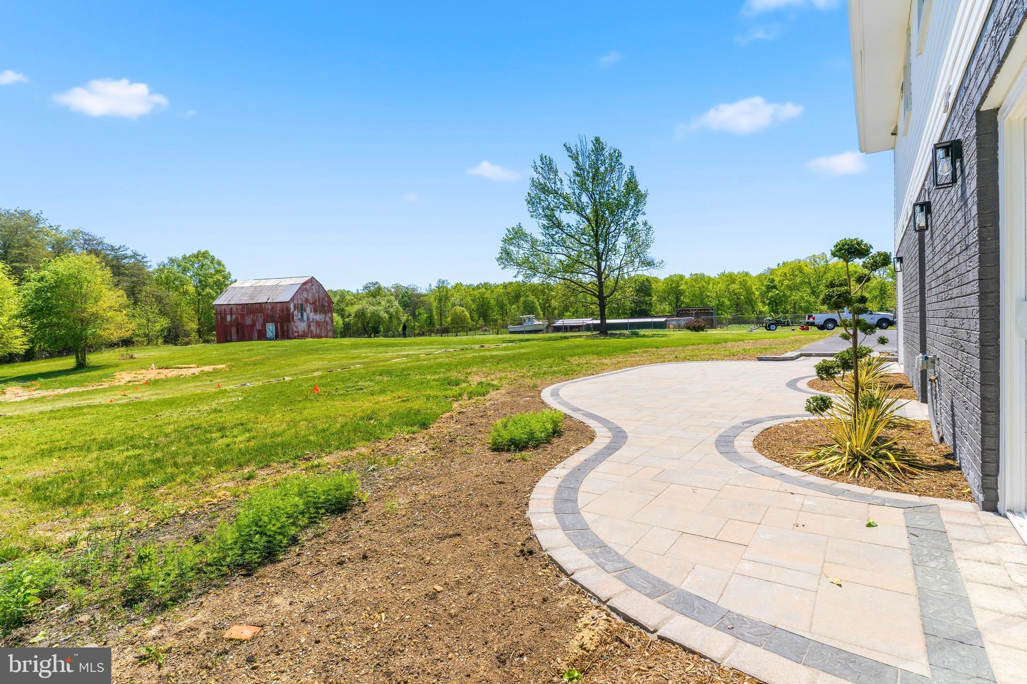 15810 Letcher Road Brandywine, MD 20613 - Photo 19 of 50 a view of a swimming pool with a yard