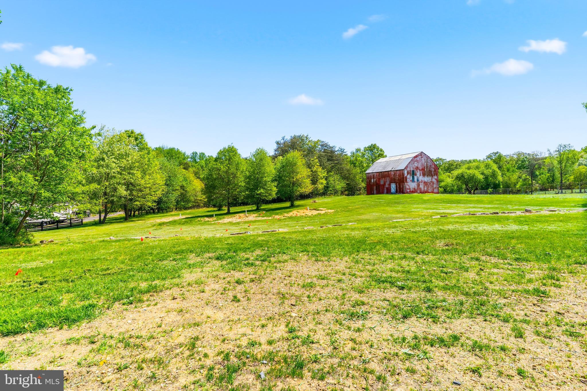15810 Letcher Road Brandywine, MD 20613 - Photo 3 of 50 a backyard of a house with lots of green space