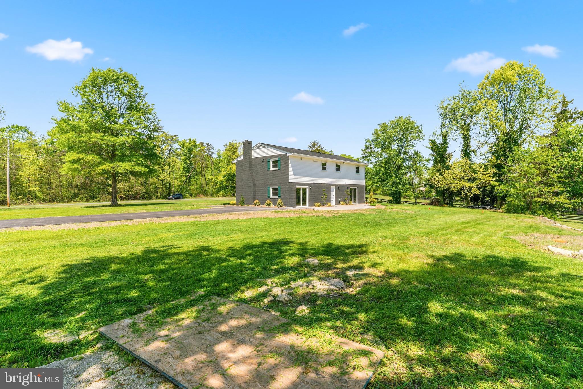 15810 Letcher Road Brandywine, MD 20613 - Photo 45 of 50 a house view with swimming pool in front of it