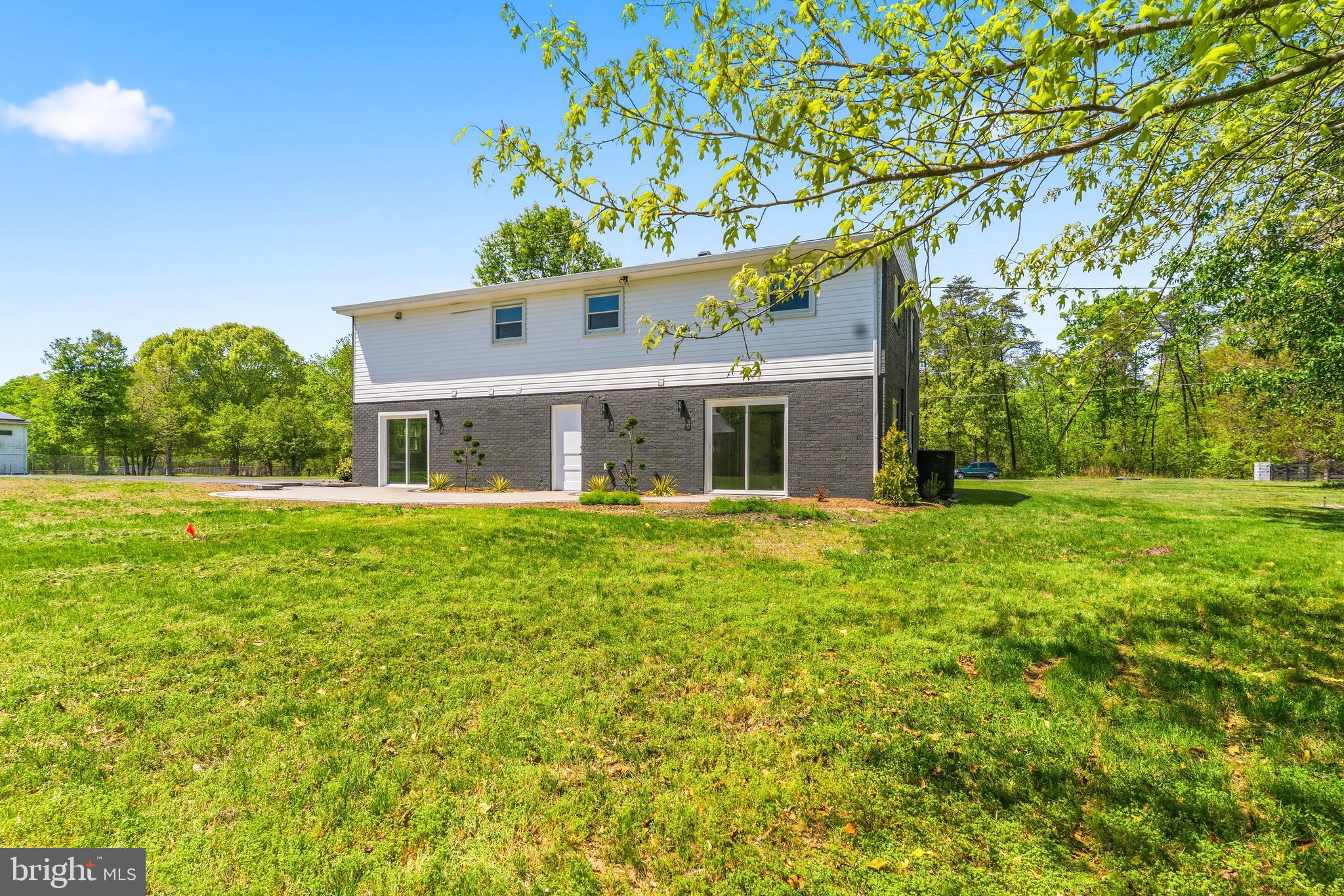 15810 Letcher Road Brandywine, MD 20613 - Photo 46 of 50 a front view of house with yard