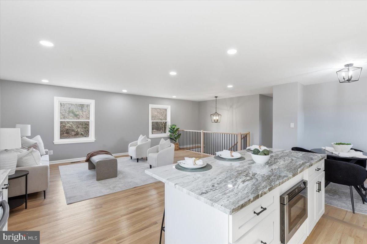 15810 Letcher Road Brandywine, MD 20613 - Photo 7 of 50 a kitchen island with granite countertop dining room