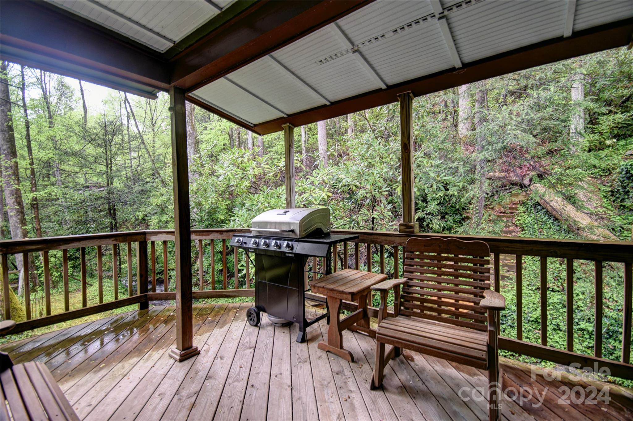 367 Johnson Branch Road Maggie Valley, NC 28751 - Photo 19 of 28 a view of a two chairs in the balcony