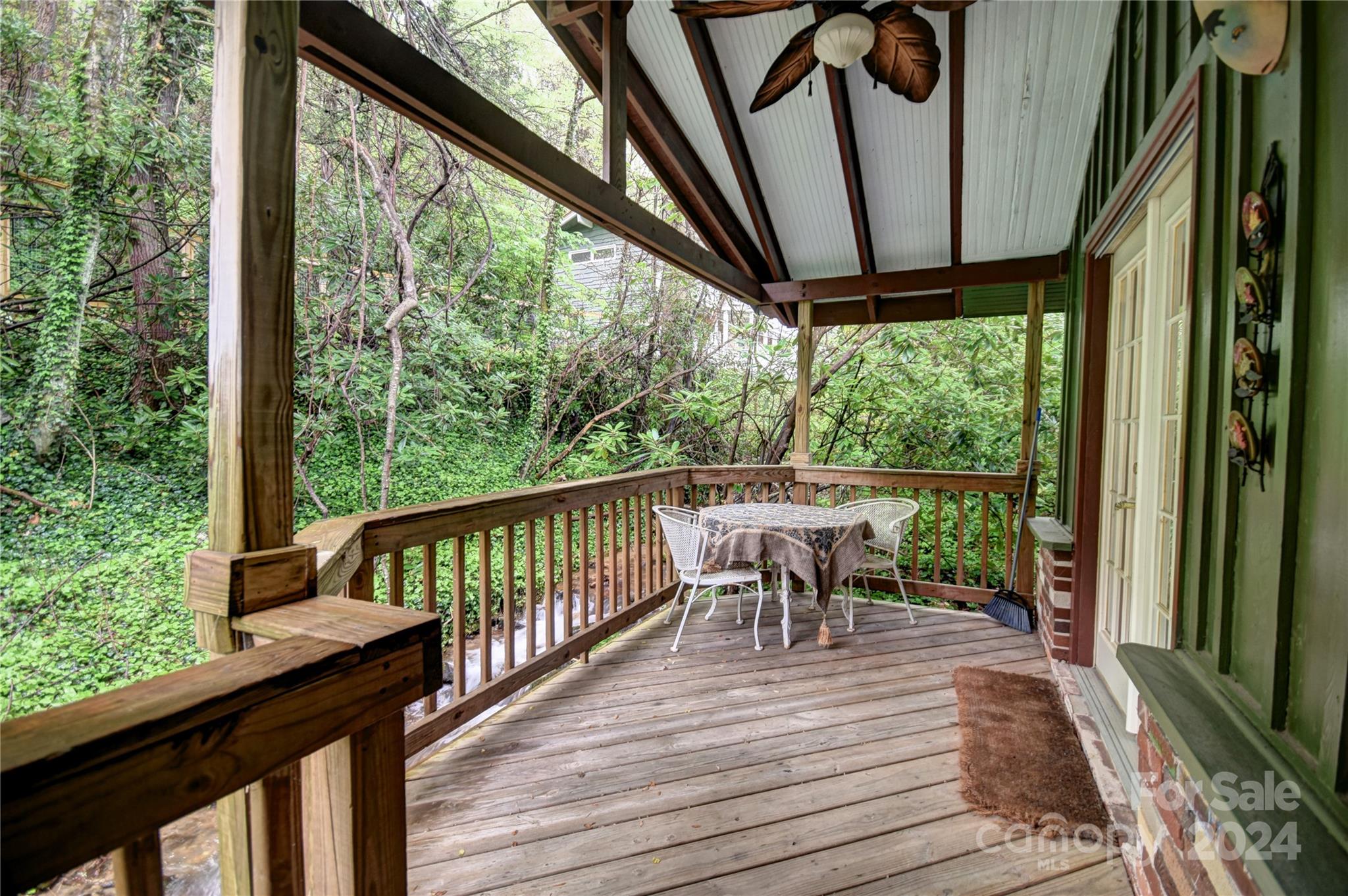 367 Johnson Branch Road Maggie Valley, NC 28751 - Photo 20 of 28 a view of a two chairs in the balcony
