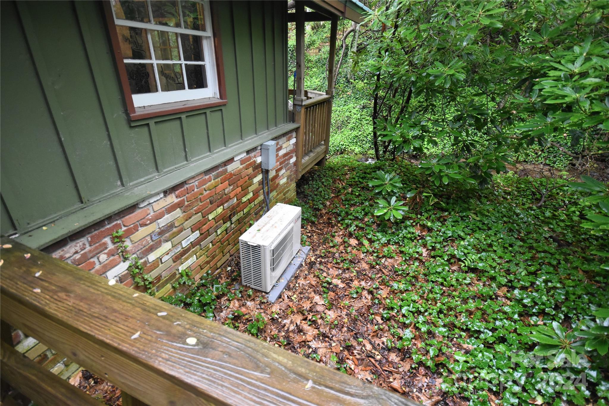 367 Johnson Branch Road Maggie Valley, NC 28751 - Photo 27 of 28 a view of a backyard with sitting area