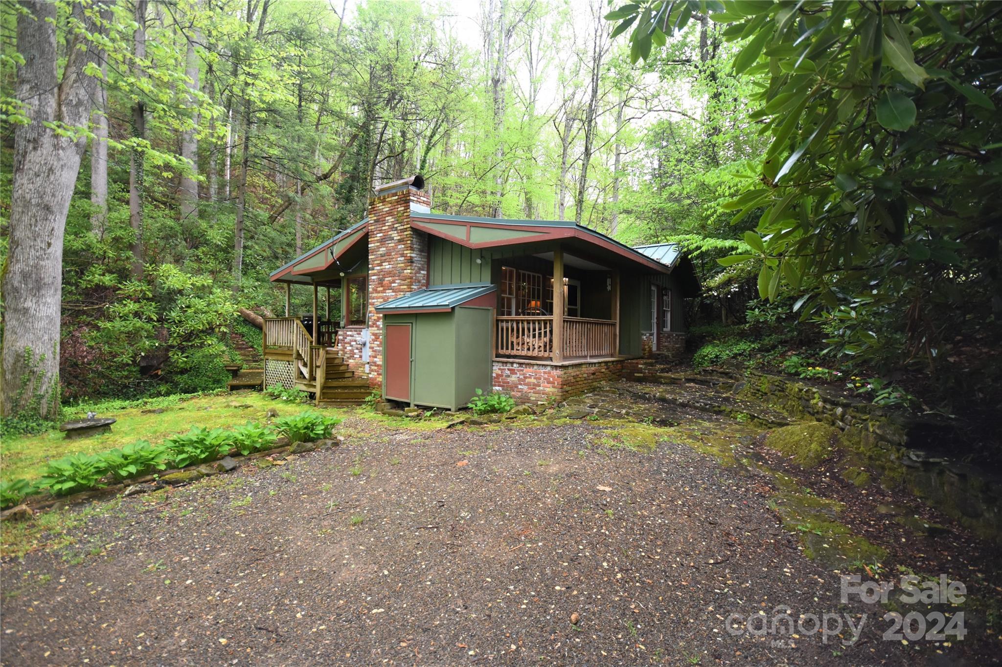 367 Johnson Branch Road Maggie Valley, NC 28751 - Photo 28 of 28 a small house in middle of the forest