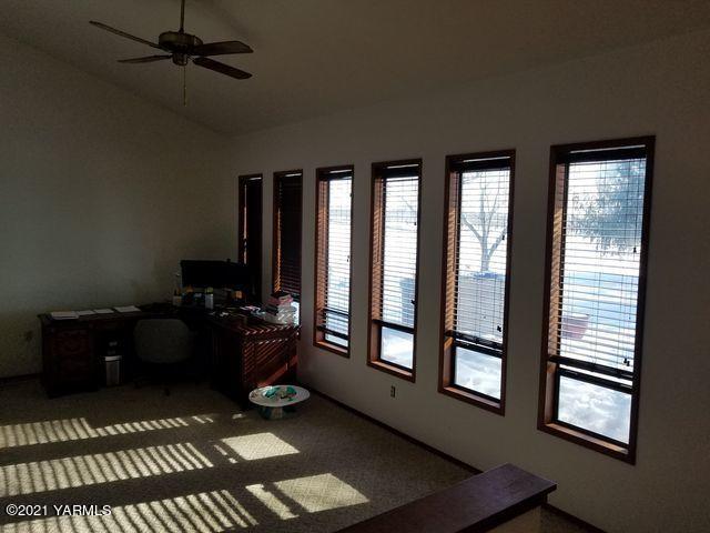 501 Mohar Road Grandview, WA 98930 - Photo 7 of 24 a living room with furniture and a window