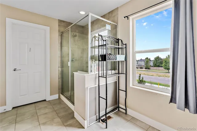 a view of a walk in closet and bedroom