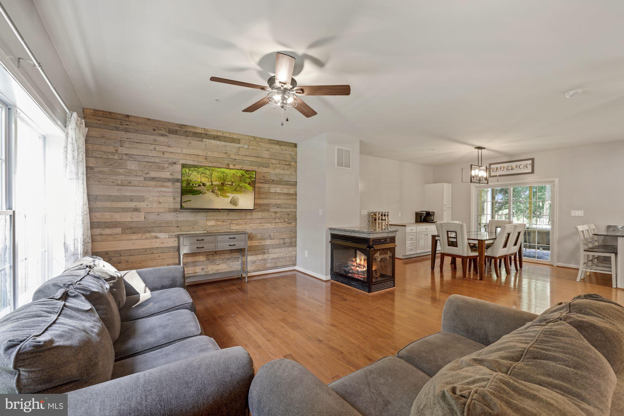 3155 Old Ridge Road Mount Airy, MD 21771 - Photo 5 of 50 Living Room with Custom Wood Wall, Gas Fireplace