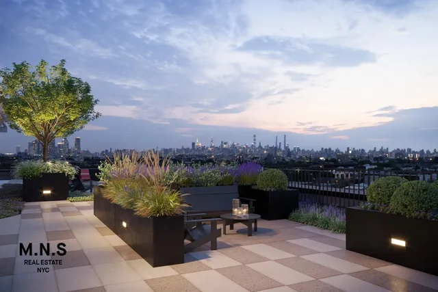 a view of a balcony with furniture and a garden