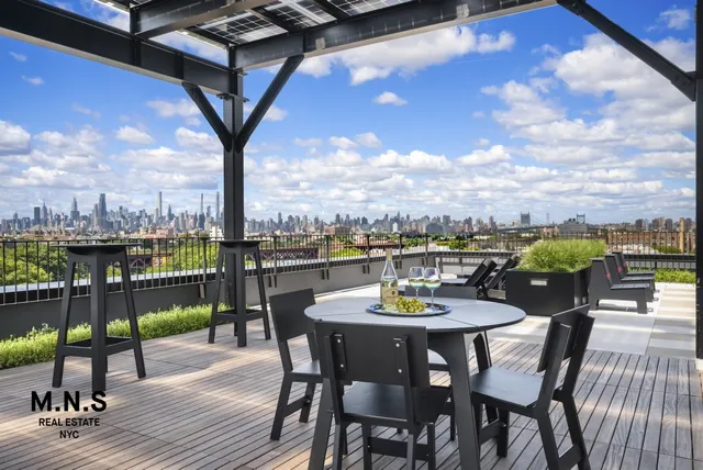 a view of a terrace with furniture