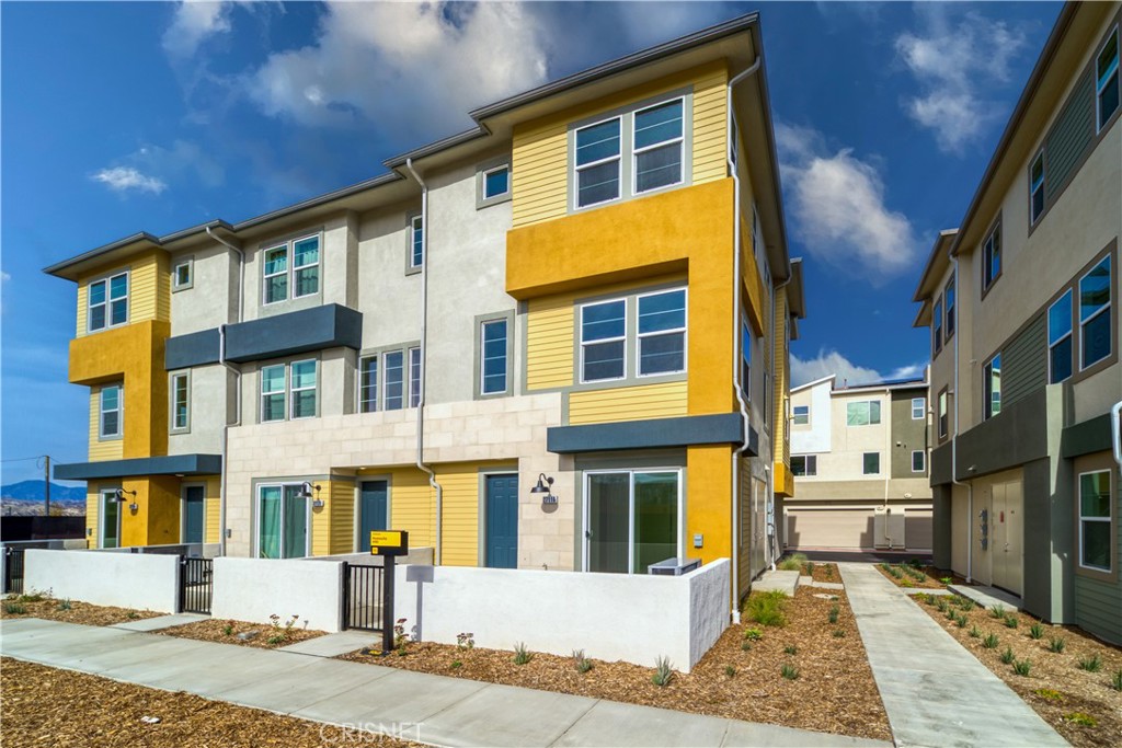27116 Red Tail Place Valencia, CA 91381 - Photo 2 of 5 a front view of a house with a yard