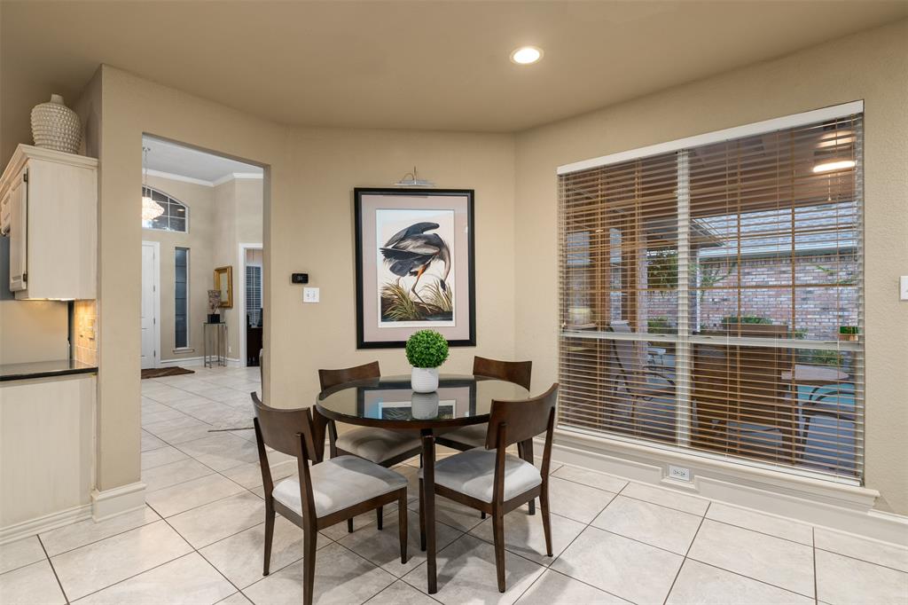 17608 Windflower Way Dallas, TX 75252 - Photo 12 of 34 Dining space featuring light tile patterned flooring and recessed lighting