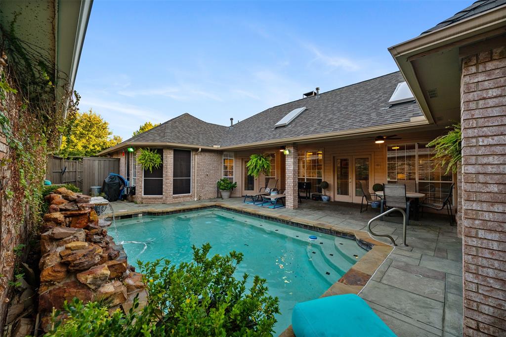 17608 Windflower Way Dallas, TX 75252 - Photo 26 of 34 View of swimming pool with a patio, french doors, a ceiling fan, and area for grilling