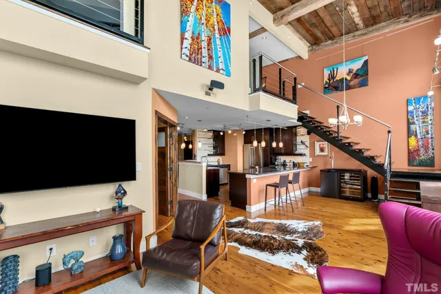 a outdoor living space with furniture and a fireplace