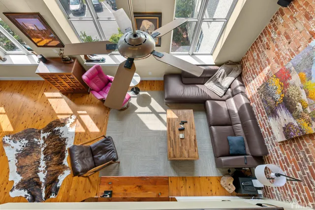 a view of living room with furniture and floor