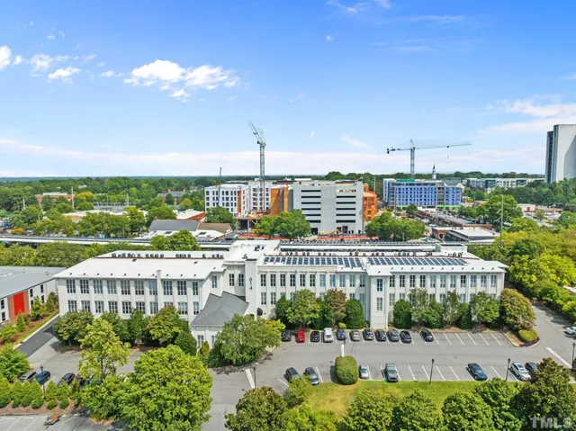 a view of a door and chair in the patio