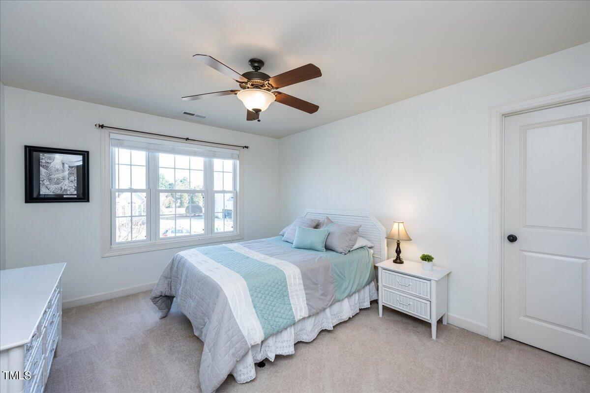 2117 Conroy Way Willow Spring, NC 27592 - Photo 25 of 38 Upstairs bedroom with a very large walk-in closet