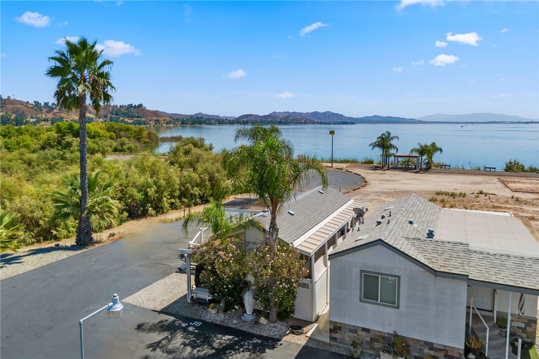 32000 Riverside Drive, Unit J8 Lake Elsinore, CA 92530 - Photo 29 of 33 a view of a terrace with a garden