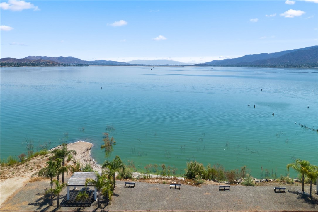 32000 Riverside Drive, Unit J8 Lake Elsinore, CA 92530 - Photo 31 of 33 a view of a lake with a mountain