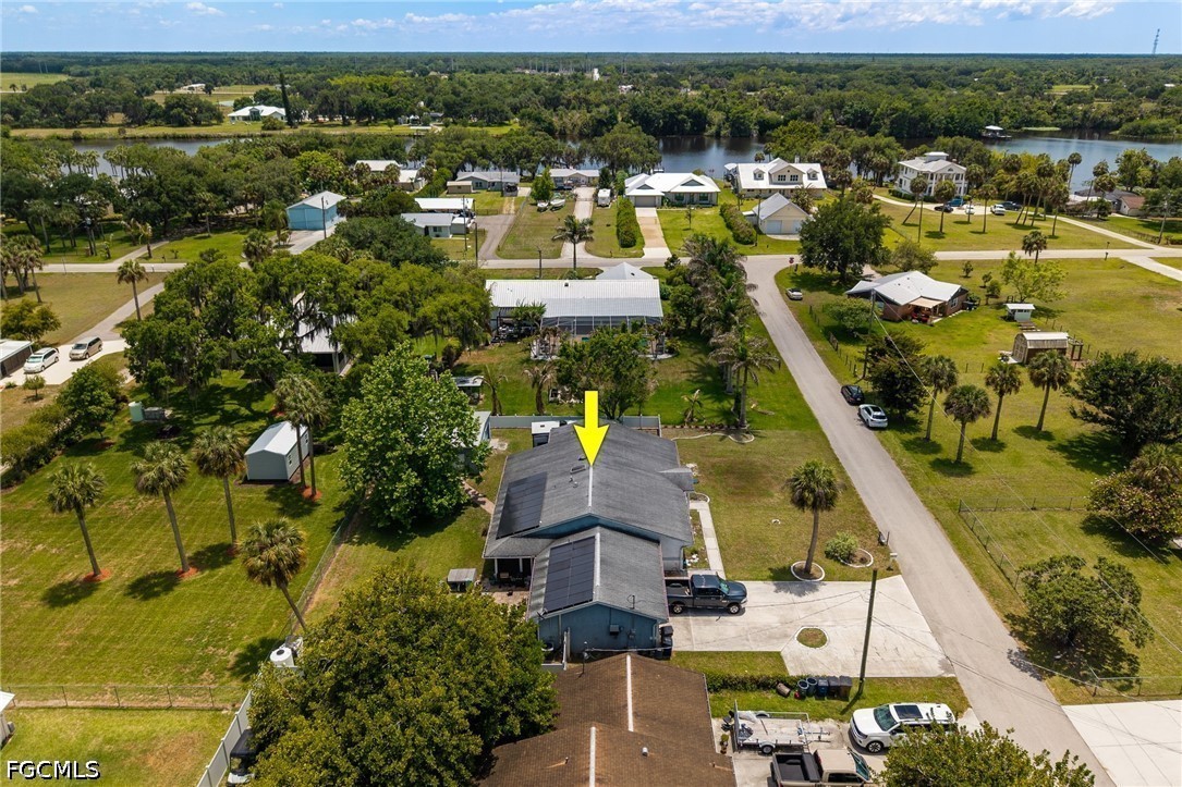 17290 Rewis Road Alva, FL 33920 - Photo 40 of 50 a view of a city with lawn chairs