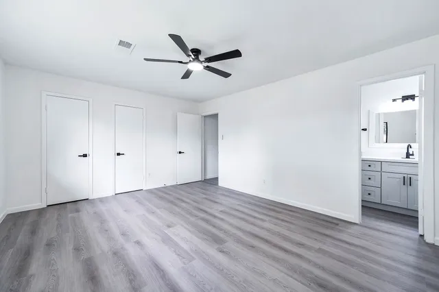 a view of a livingroom with wooden floor