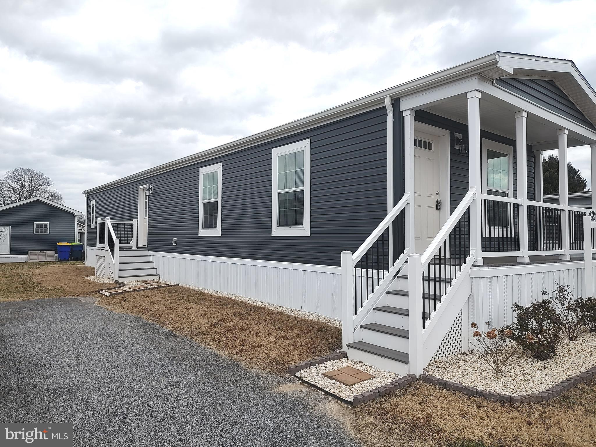 42 Colonial Lane Rehoboth Beach, DE 19971 - Photo 2 of 25 a view of entryway with a front door