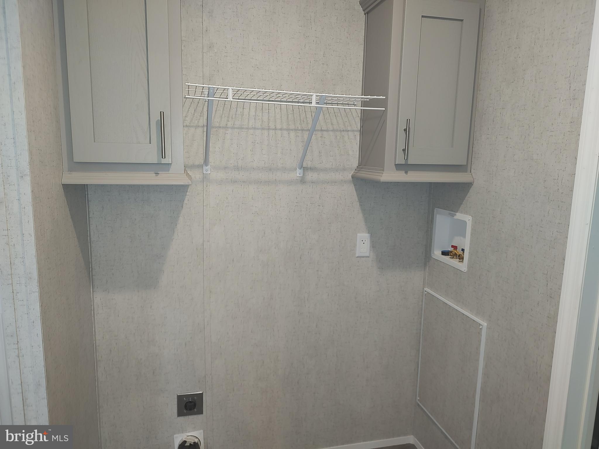 42 Colonial Lane Rehoboth Beach, DE 19971 - Photo 23 of 25 a view of small space with racks on the wall