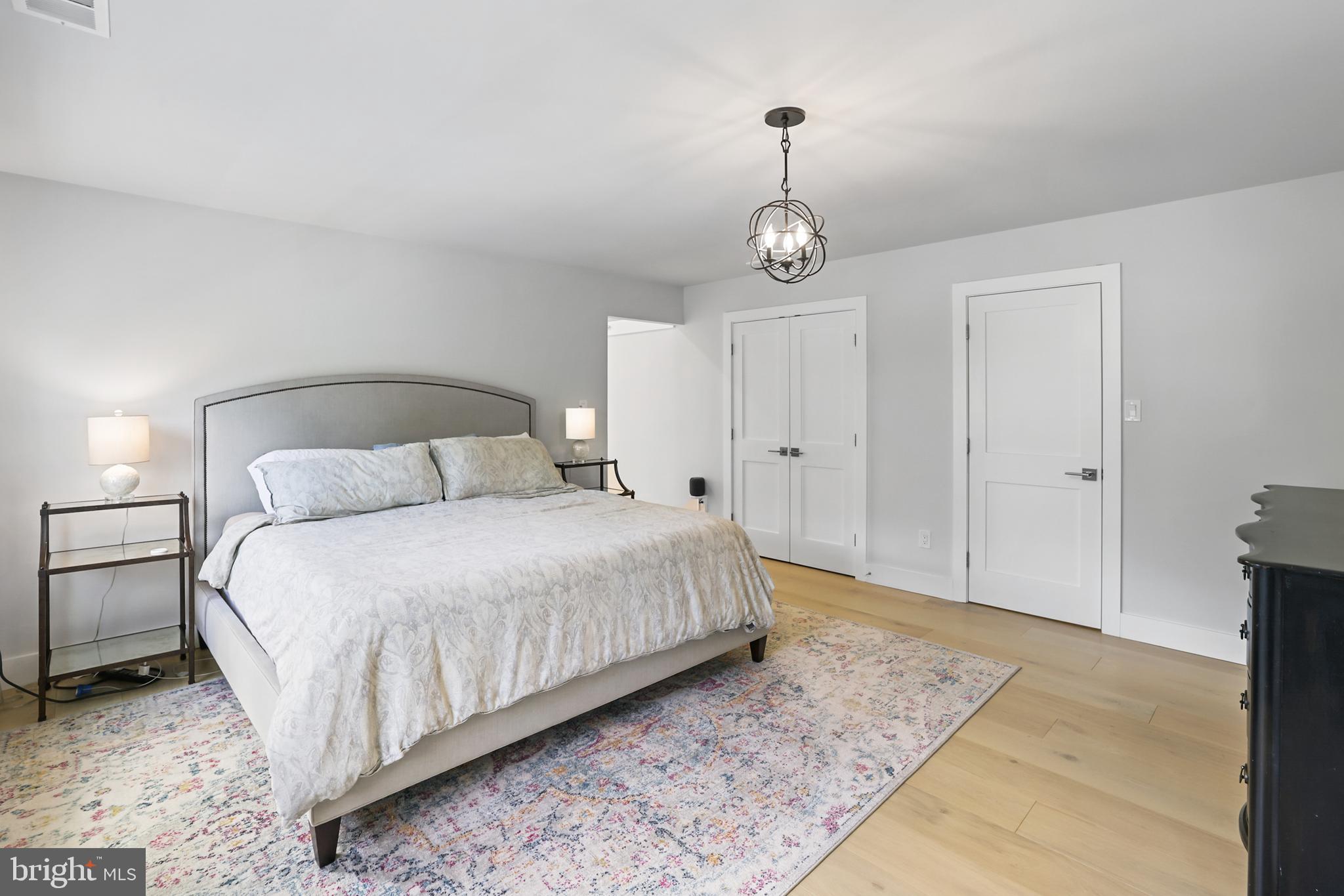 1610 Autumnwood Drive Reston, VA 20194 - Photo 16 of 55 Primary bedroom with 9" wide-plank hardwood
