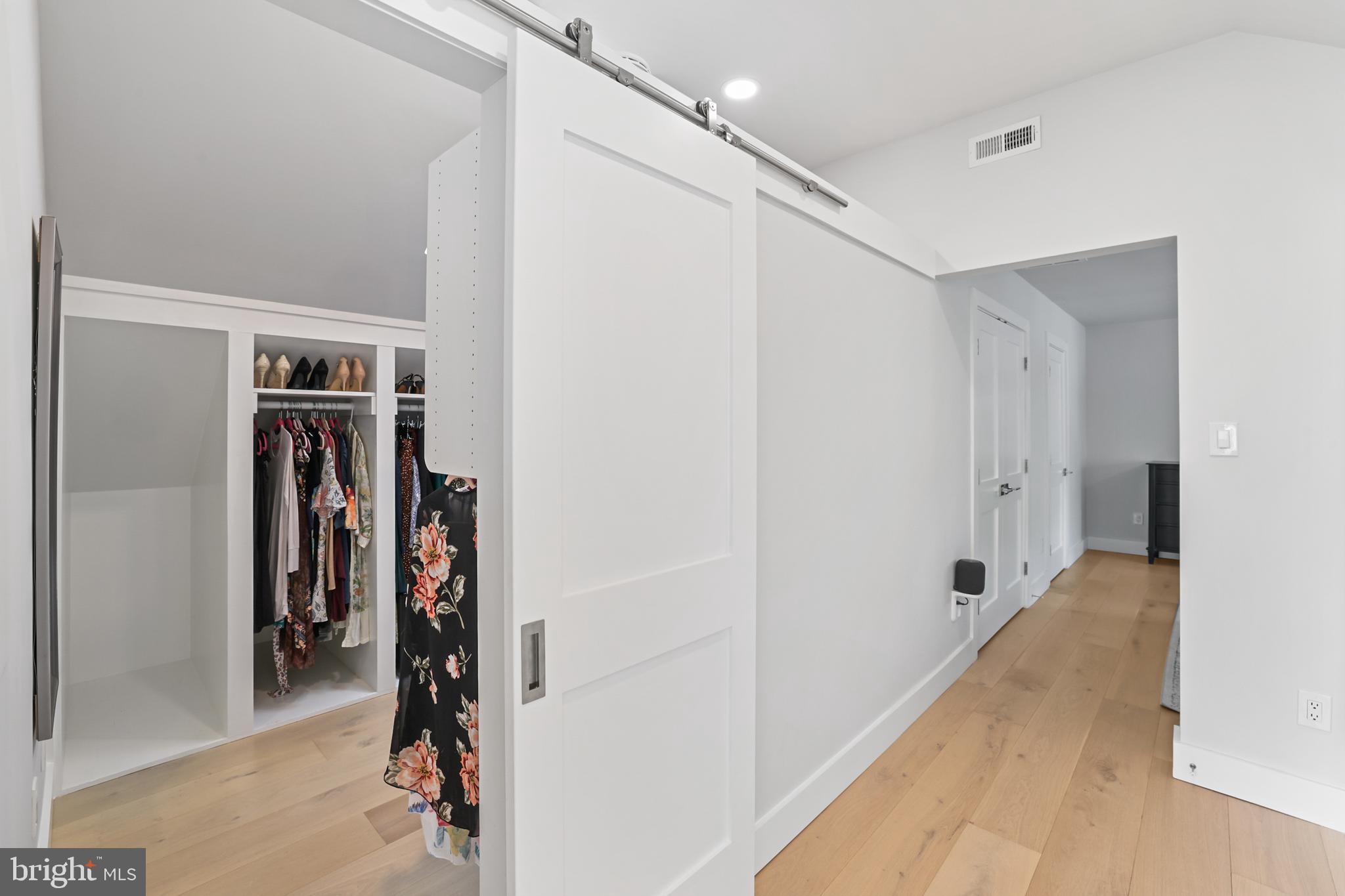 1610 Autumnwood Drive Reston, VA 20194 - Photo 17 of 55 Barn door leads to large walk-in closet