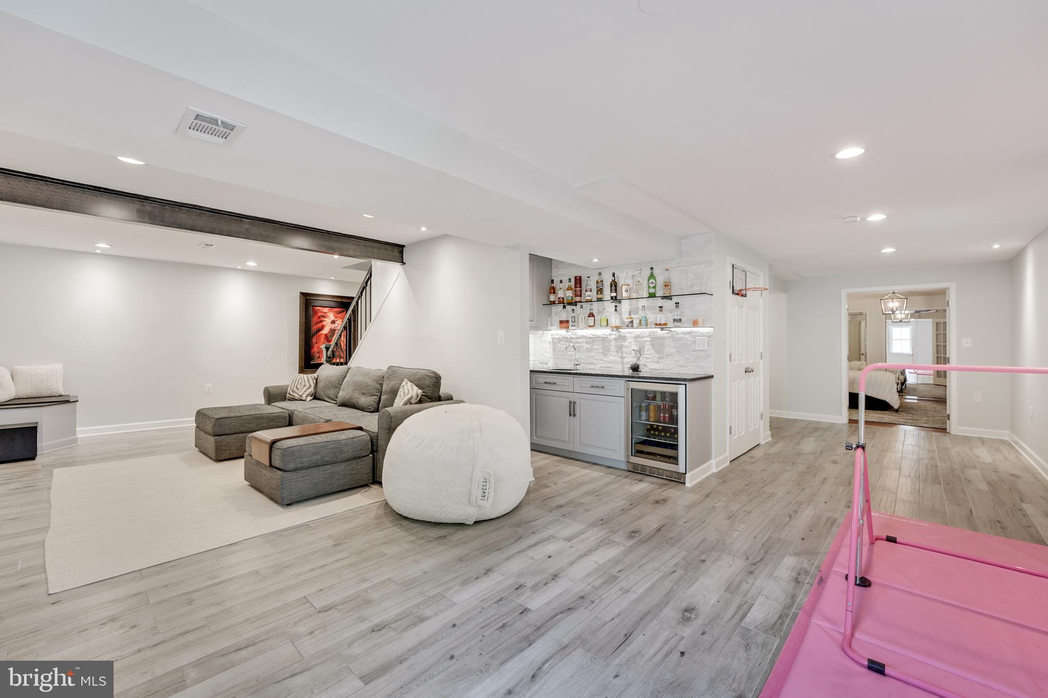 1610 Autumnwood Drive Reston, VA 20194 - Photo 42 of 55 Open recreation room with wet bar